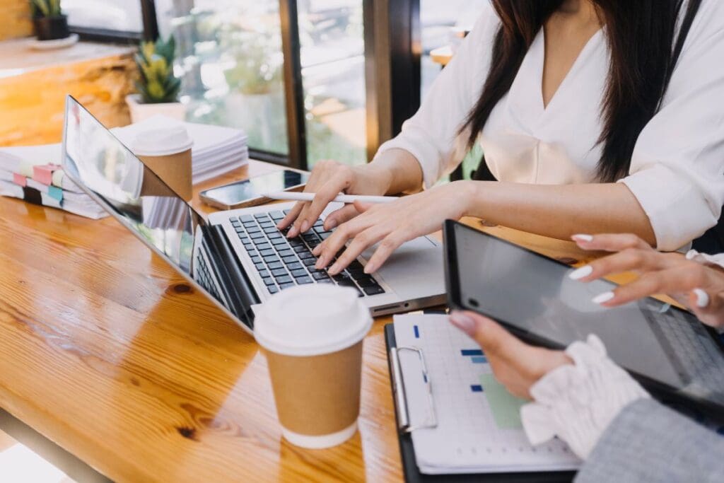 Female entrepreneur confidently leading a business meeting.
