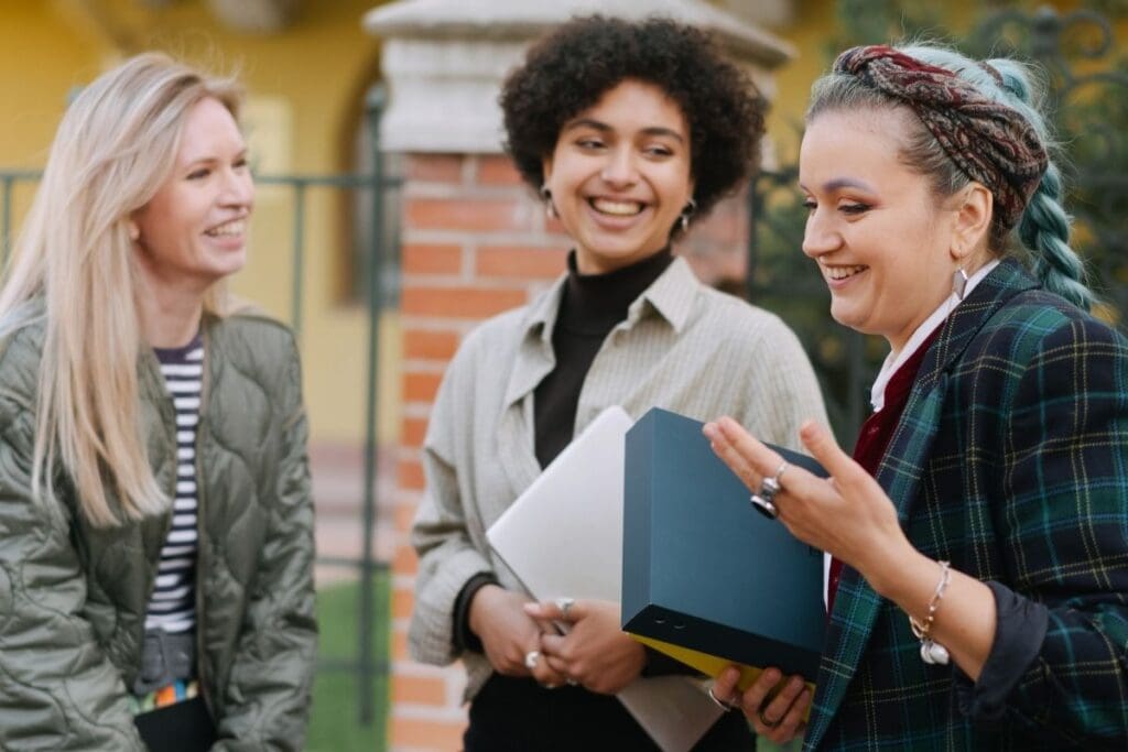 Businesswoman sharing a relatable story during a sales conversation.