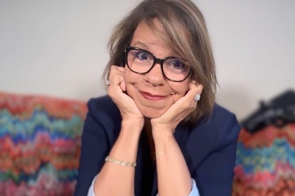 Genevieve Skory smiling confidently, showing calm authenticity while selling without being pushy.