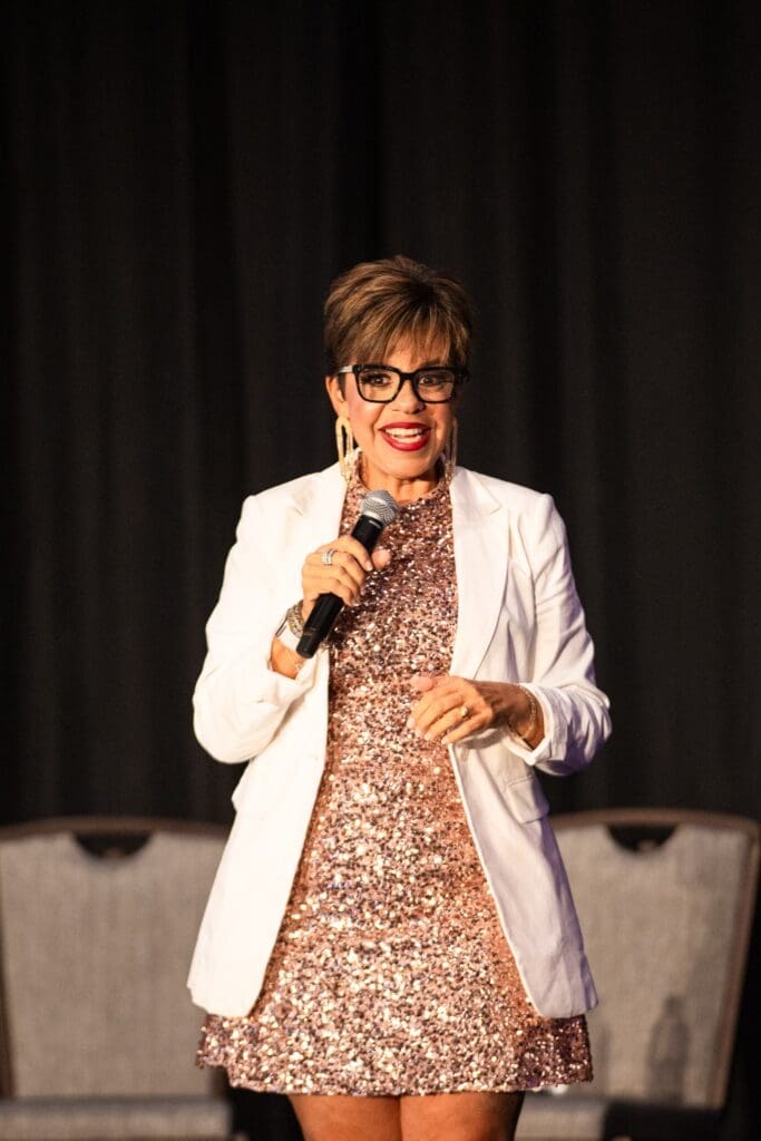 Genevieve talking on stage about going from side hustle to full time business